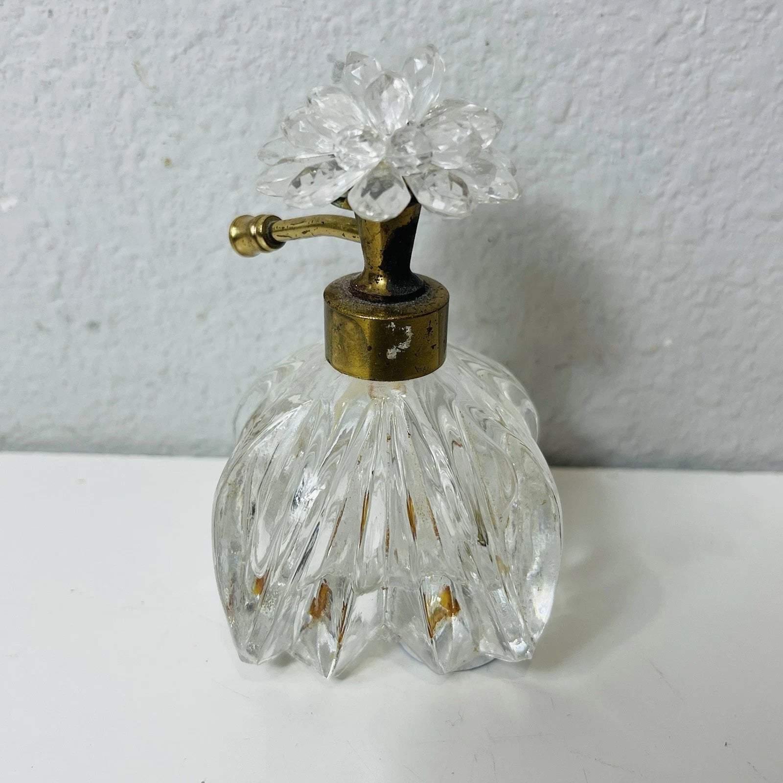 Clear Glass Perfume Bottle with Metal Flower & Rhinestone Pump Accent – Decorative