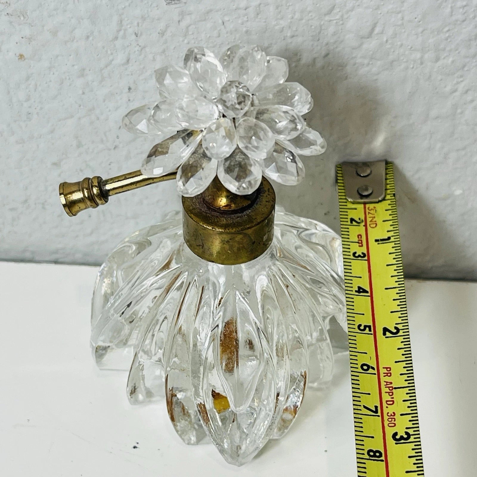 Clear Glass Perfume Bottle with Metal Flower & Rhinestone Pump Accent – Decorative